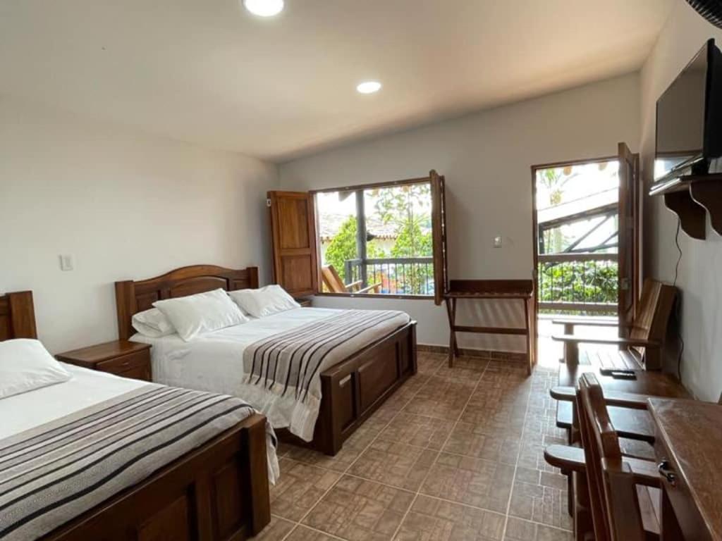 Hotel Bosques Del Saman Alcala 金巴亚 外观 照片
